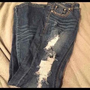 Size 27 ripped jeans with bling pockets